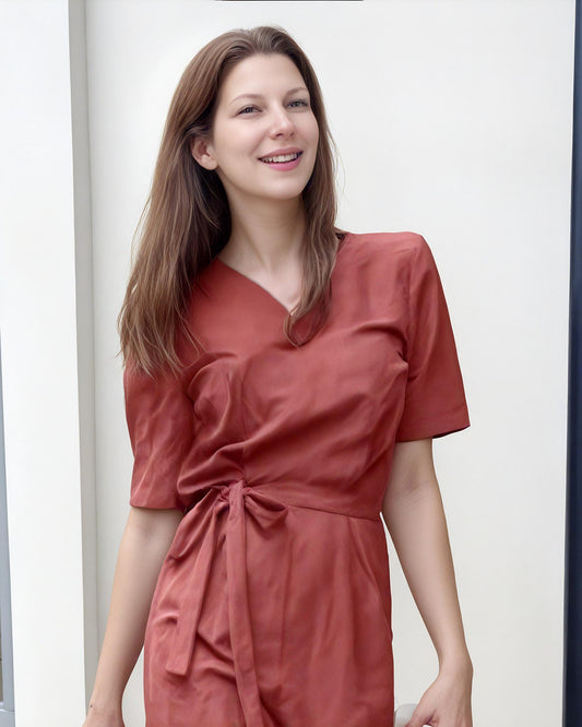 Elegant Linen V-Neck Jumpsuit with Back Button Detail | SKU.25T11T7H